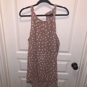Tan sleeveless blouse